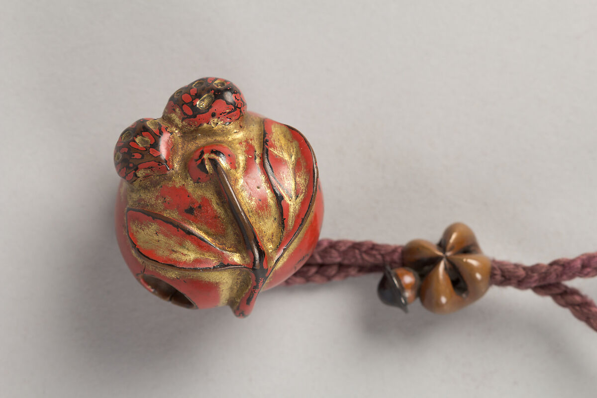 Case (Inrō) with Design of Daruma (obverse);  Fly Whisk (Hossu) (reverse), Lacquer, tan, brown ground, gold, black and red togidashi; Interior: nashiji and fundame, Japan