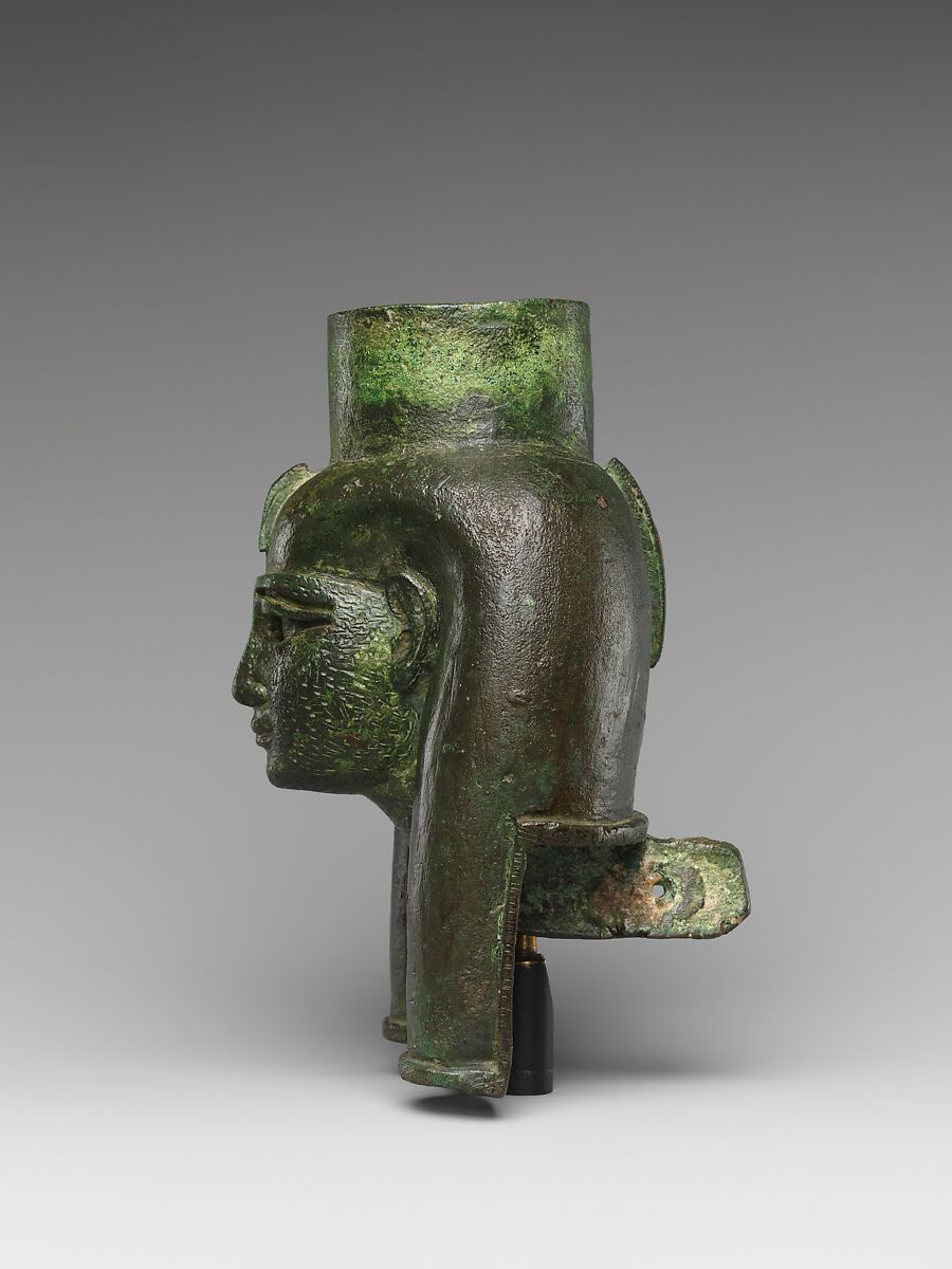 Head of a goddess, probably Mut, for attachment to a processional barque, Cupreous metal, gold leaf, formerly inlaid