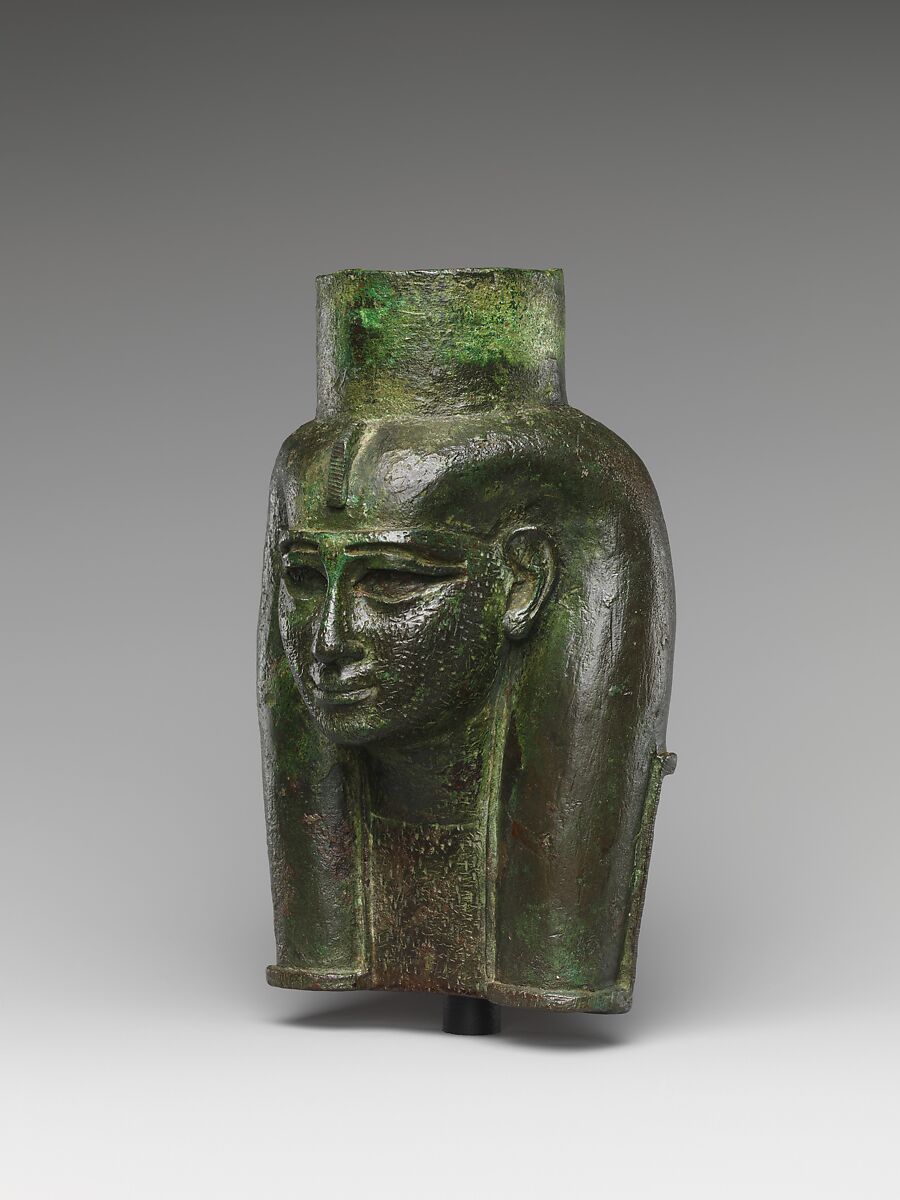 Head of a goddess, probably Mut, for attachment to a processional barque, Cupreous metal, gold leaf, formerly inlaid
