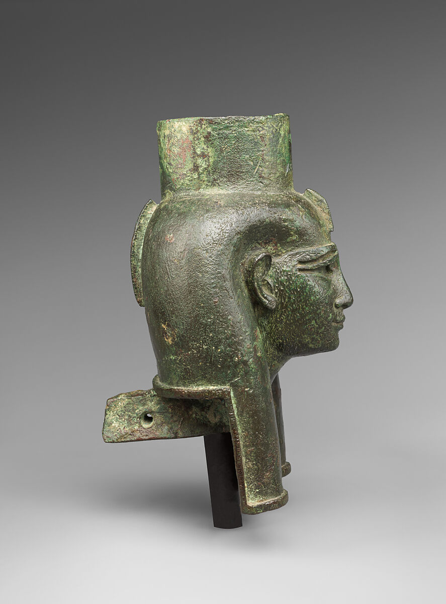 Head of a goddess, probably Mut, for attachment to a processional barque, Cupreous metal, gold leaf, formerly inlaid