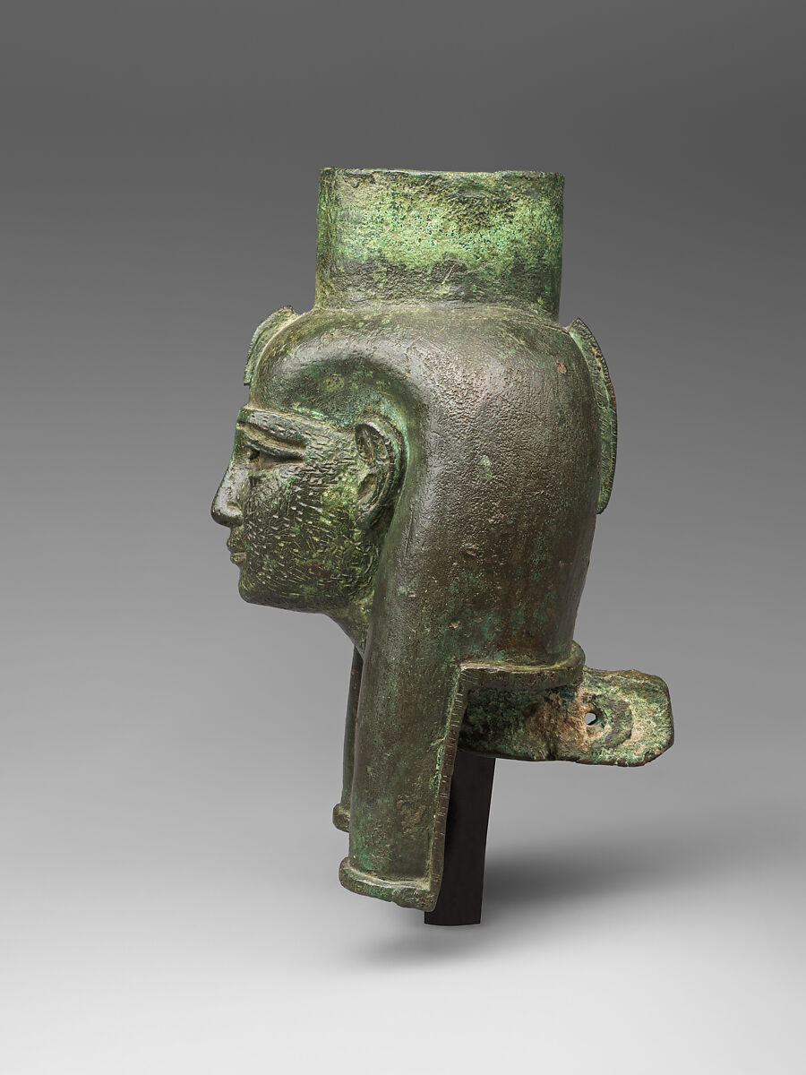 Head of a goddess, probably Mut, for attachment to a processional barque, Cupreous metal, gold leaf, formerly inlaid