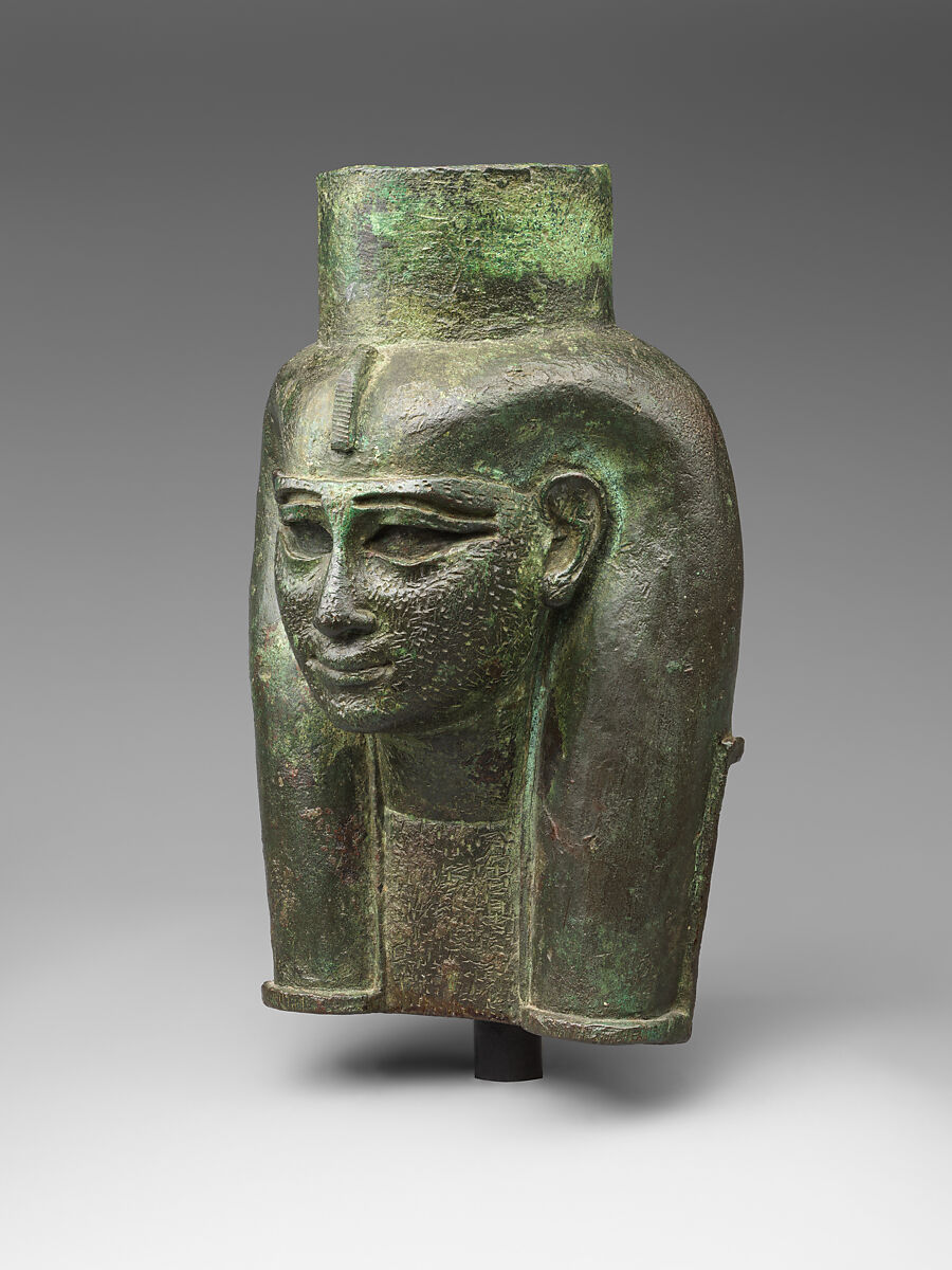 Head of a goddess, probably Mut, for attachment to a processional barque, Cupreous metal, gold leaf, formerly inlaid