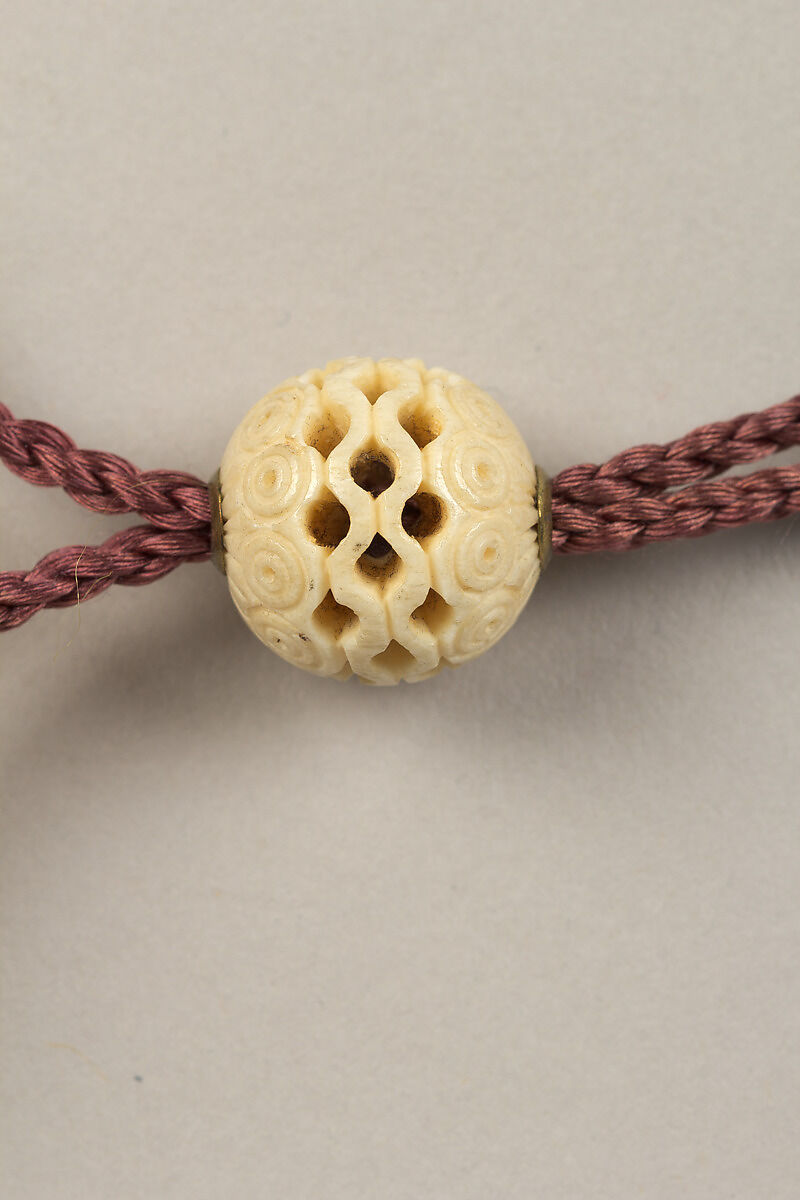 Inrō with Noh Masks, Two-part sheath type; lacquered wood with gold, silver, color takamaki-e, hiramaki-e, and carved lacquer and ceramic inlay on hirameji ground 
Netsuke: Shōki the Demon Queller; ivory
Ojime: openwork ivory bead, Japan