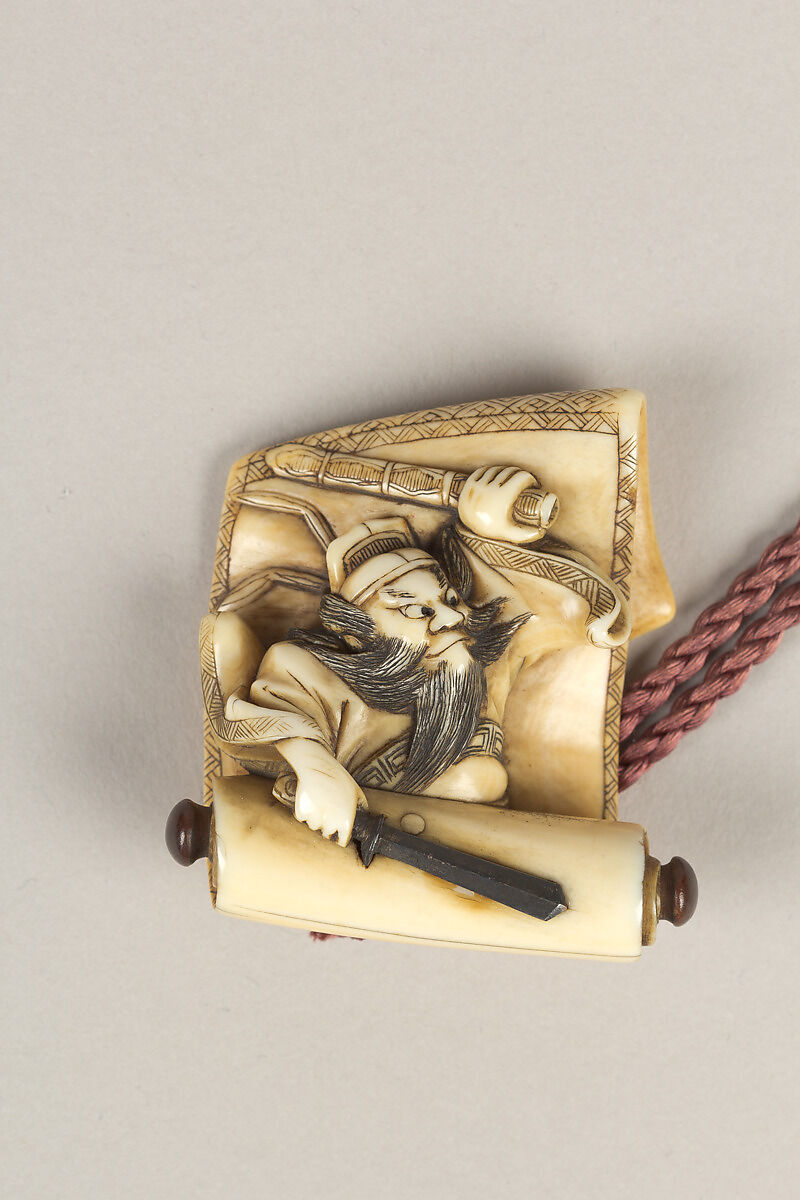 Inrō with Noh Masks, Two-part sheath type; lacquered wood with gold, silver, color takamaki-e, hiramaki-e, and carved lacquer and ceramic inlay on hirameji ground 
Netsuke: Shōki the Demon Queller; ivory
Ojime: openwork ivory bead, Japan