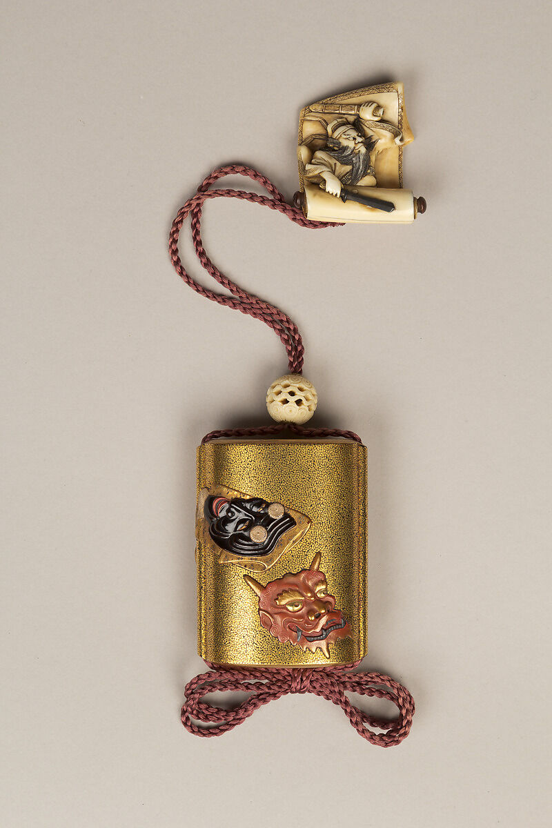 Inrō with Noh Masks, Two-part sheath type; lacquered wood with gold, silver, color takamaki-e, hiramaki-e, and carved lacquer and ceramic inlay on hirameji ground 
Netsuke: Shōki the Demon Queller; ivory
Ojime: openwork ivory bead, Japan 