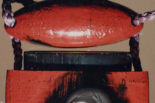 Case (Inrō) with Design of Daruma (obverse); Fly Whisk and Scepter (reverse), Lacquer, red, textile background, gold, silver and black hiramakie, takamakie; Interior: roiro and fundame, Japan