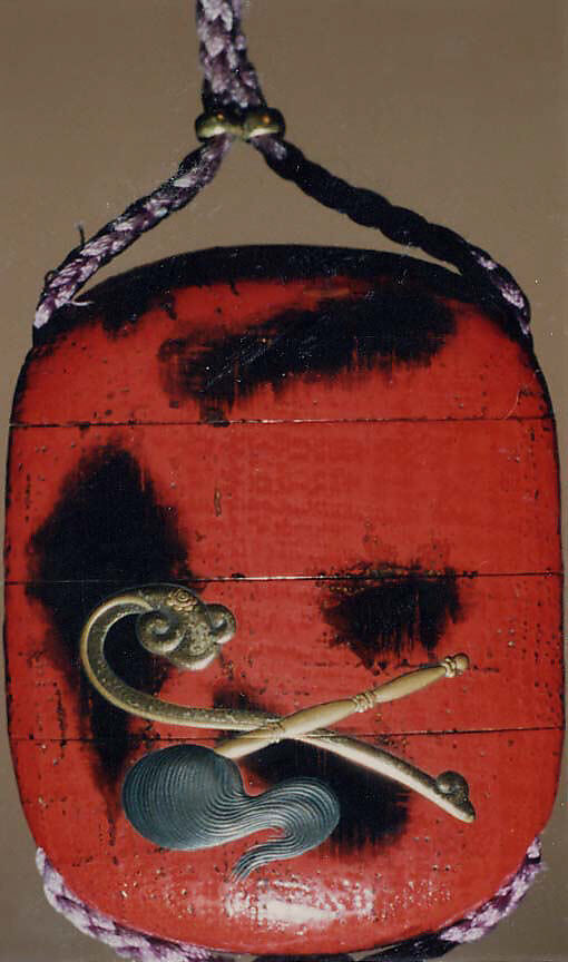Case (Inrō) with Design of Daruma (obverse); Fly Whisk and Scepter (reverse), Lacquer, red, textile background, gold, silver and black hiramakie, takamakie; Interior: roiro and fundame, Japan