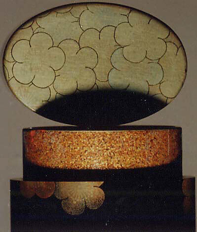 Saya Inrō with Pine and Ivy (obverse) and Bamboo Grove (reverse), Sheath shape; lacquered wood with gold and silver takamaki-e, hiramaki-e, togidashimaki-e, and colored ivory inlay on gold lacquer ground Netsuke: kagamibuta type, lotus pad with frog; stained ivory and metal, Japan