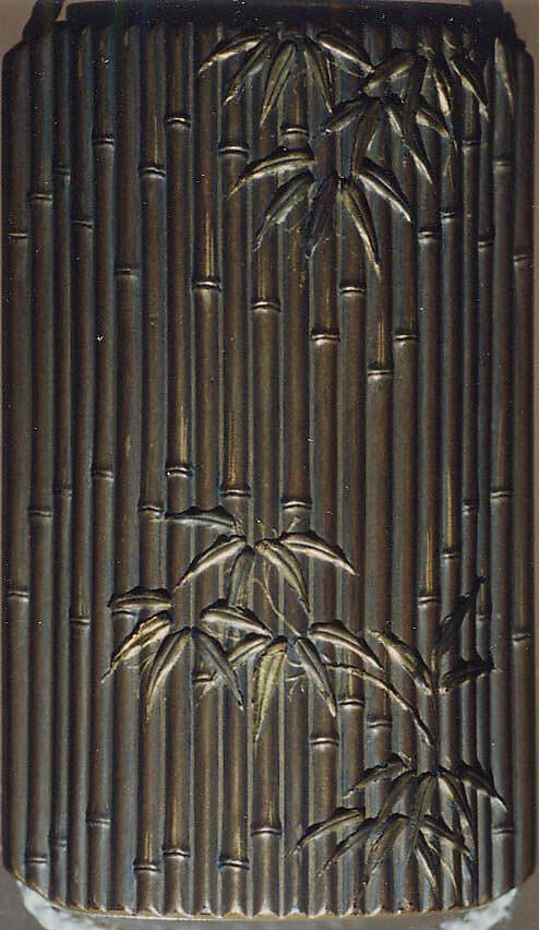 Saya Inrō with Pine and Ivy (obverse) and Bamboo Grove (reverse), Sheath shape; lacquered wood with gold and silver takamaki-e, hiramaki-e, togidashimaki-e, and colored ivory inlay on gold lacquer ground Netsuke: kagamibuta type, lotus pad with frog; stained ivory and metal, Japan