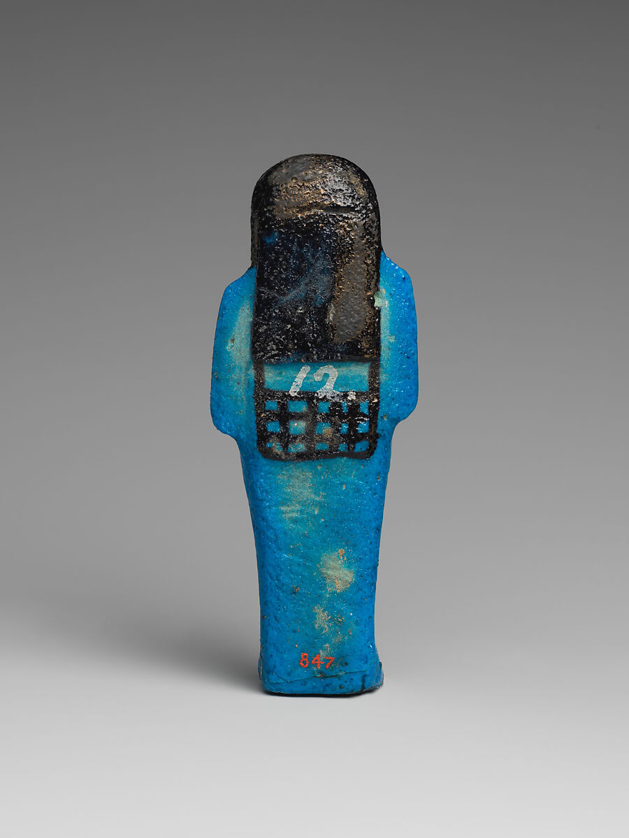 Shabti of the Adoratrice of Hathor ("Duahathor")  Henettawy, wife of Painedjem I, Faience