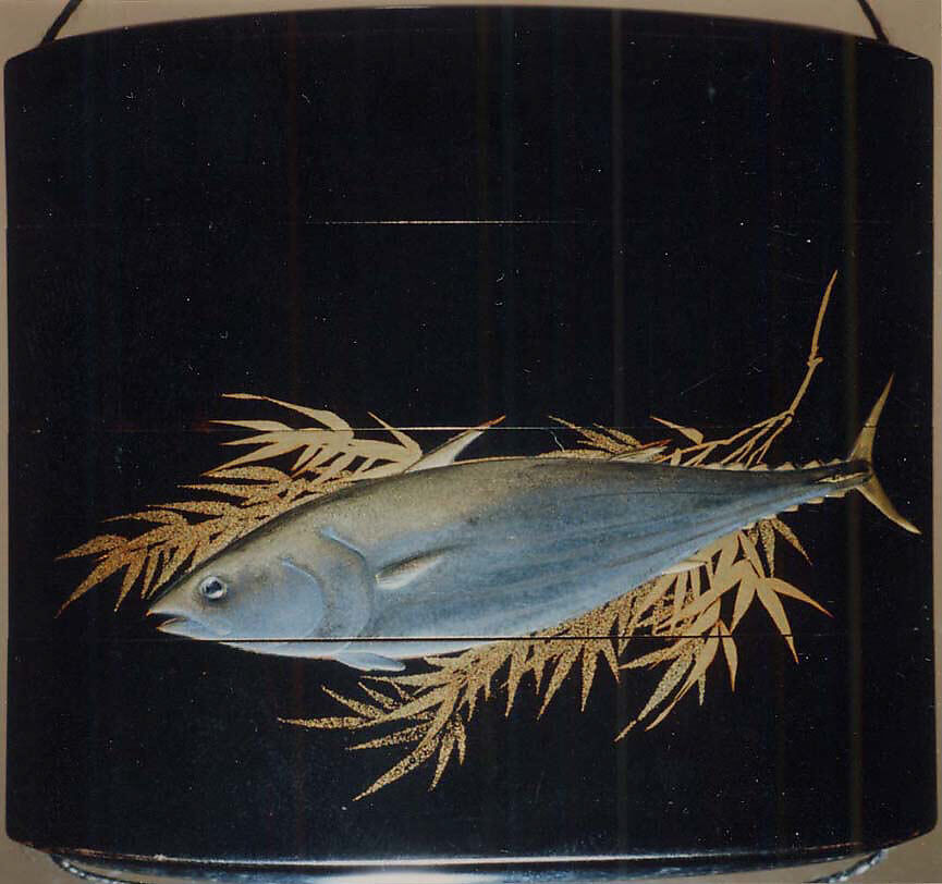 Case (Inrō) with Design of Flying Cuckoo in Flight above Pines (obverse); Bonito (Fish) on Bamboo Leaves (reverse), Toyōsai (1772–1845), Black lacquer with sprinkled gold and silver makie and mother-of-pearl
Ojime: bead with openwork design of waves; silver
Netsuke: fish laid on bamboo branch; stained ivory, Japan