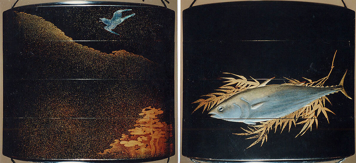 Case (Inrō) with Design of Flying Cuckoo in Flight above Pines (obverse); Bonito (Fish) on Bamboo Leaves (reverse), Toyōsai (1772–1845), Black lacquer with sprinkled gold and silver makie and mother-of-pearl
Ojime: bead with openwork design of waves; silver
Netsuke: fish laid on bamboo branch; stained ivory, Japan 