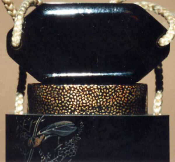 Case (Inrō) with Design of Bird and Two Young beside Flowering Mustard Plant (obverse); Inscription (reverse), Hosoya Hansai (Japanese), Lacquer, roiro, black hiramakie, incised; Interior: roiro and hirame, Japan