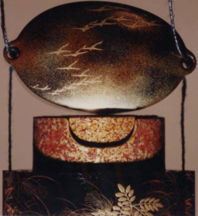 Case (Inrō) with Design of the Courtier Yasusuke Playing Flute beneath Full Moon (obverse); His Brother Kidomaru Hiding among Autumn Grasses (reverse), Lacquer, roiro, gold, silver, black and red hiramakie, takamakie, togidashi; Interior: gyobu nashiji and fundame, boxes, Japan