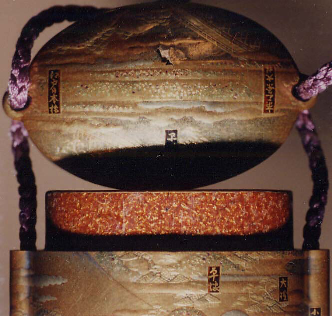 Inrō with the “Fifty-three Stations of the Tōkaidō”, Five cases; lacquered wood with gold and silver takamaki-e, hiramaki-e, togidashimaki-e, cut-out gold foil on gold and nashiji groundNetsuke: carved wood; Kintarō beating a TenguOjime: gold bead with stag in relief , Japan