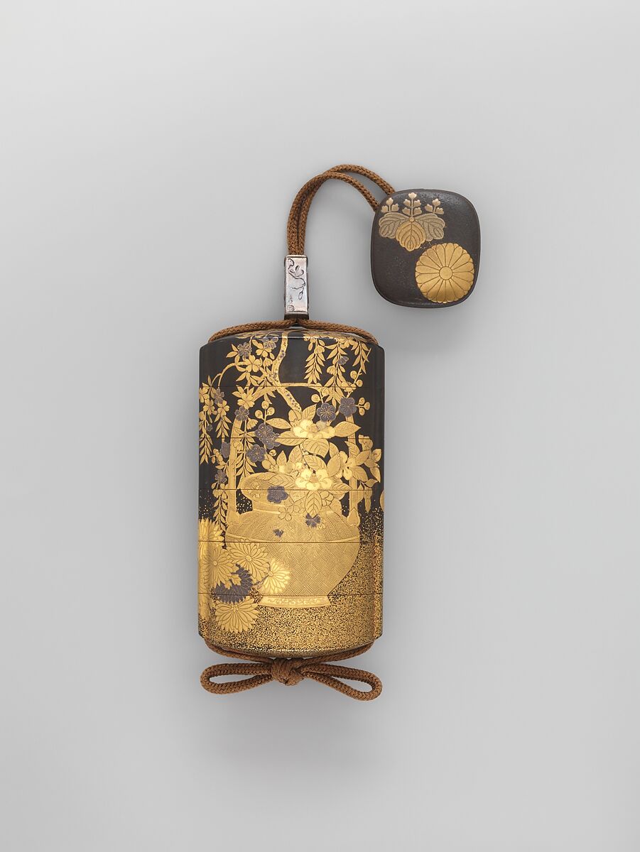 Inrō with Basket of Spring Flowers (obverse); Basket of Autumn Flowers (reverse), Five cases; lacquered wood with gold and silver hiramaki-e, togidashimaki-e, cutout gold foil application on black and nashiji lacquer groundNetsuke: lacquered wood with hiramaki-e; chrysanthemum and paulownia flowerOjime: silver bead inlaid with gold, Japan