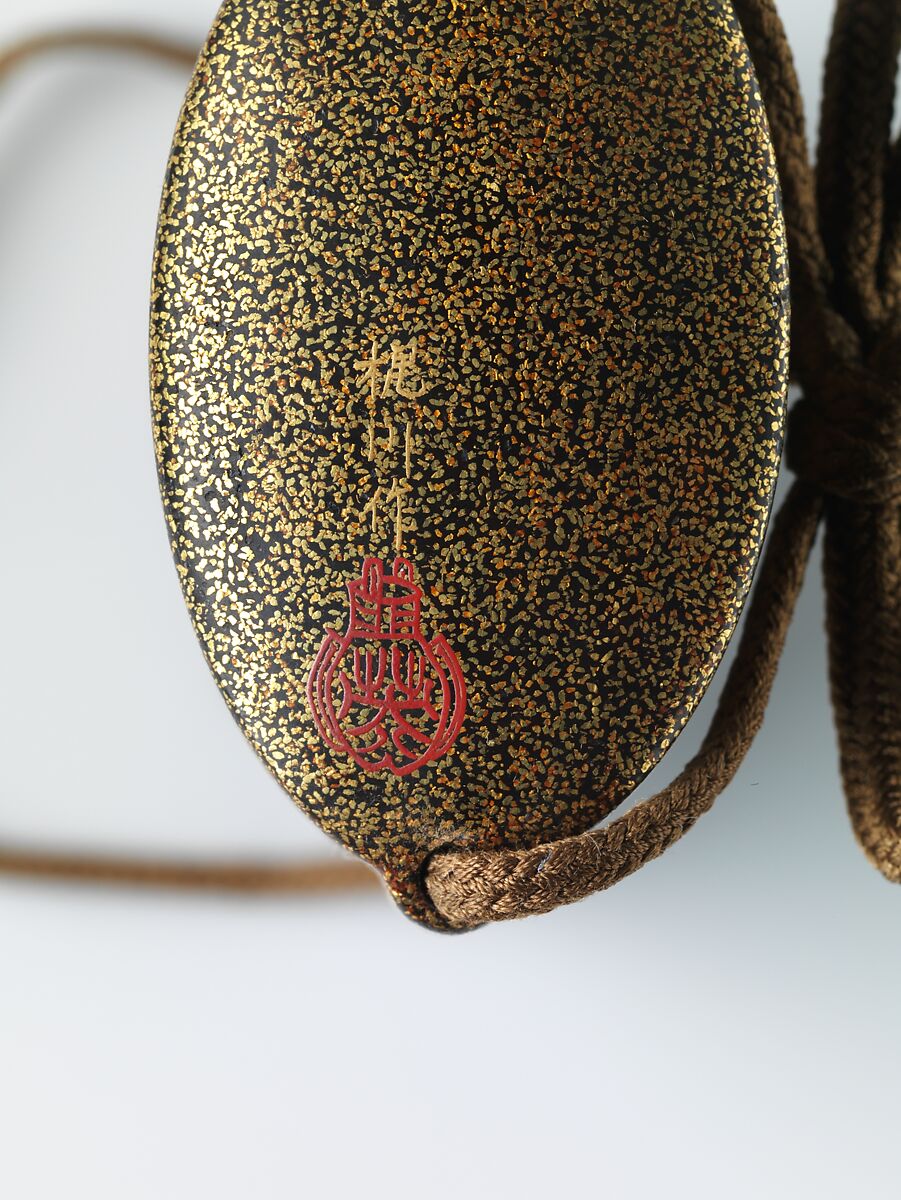 Inrō with Basket of Spring Flowers (obverse); Basket of Autumn Flowers (reverse), Five cases; lacquered wood with gold and silver hiramaki-e, togidashimaki-e, cutout gold foil application on black and nashiji lacquer groundNetsuke: lacquered wood with hiramaki-e; chrysanthemum and paulownia flowerOjime: silver bead inlaid with gold, Japan