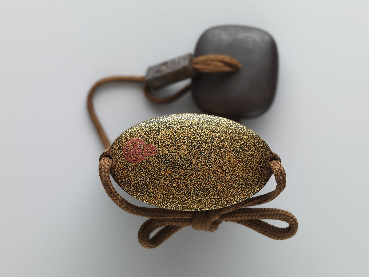 Inrō with Basket of Spring Flowers (obverse); Basket of Autumn Flowers (reverse), Five cases; lacquered wood with gold and silver hiramaki-e, togidashimaki-e, cutout gold foil application on black and nashiji lacquer groundNetsuke: lacquered wood with hiramaki-e; chrysanthemum and paulownia flowerOjime: silver bead inlaid with gold, Japan