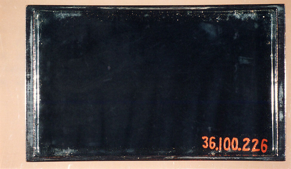 Inrō Imitating an Old Chinese Ink Cake, Ogawa Haritsu (Ritsuō) (Japanese, 1663–1747), Two-part (sheath-type); lacquered wood, metal, leather, with black and brown togidashimaki-e, takamaki-e on black groundNetsuke: manjū type with maki-e DarumaOjime: ceramic bead with incense and ash design , Japan