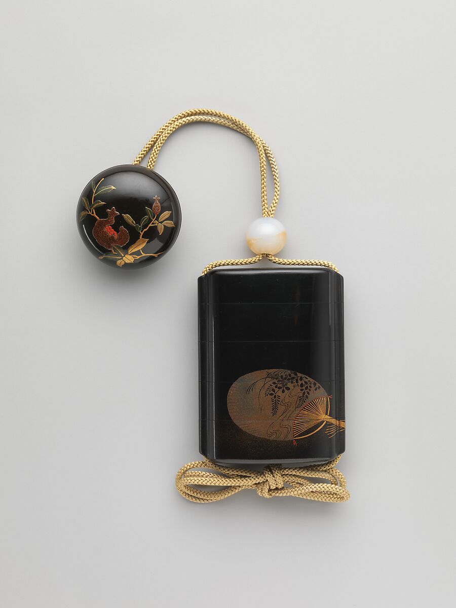 Case (Inrō) with Design of Fireworks (obverse); Design of Fan (reverse), Case: red lacquer and powdered gold and silver (maki-e) on black lacquer; Fastener ojime): stone; Toggle (netsuke): colored lacquer on black lacquer with design of pomegranate, Japan