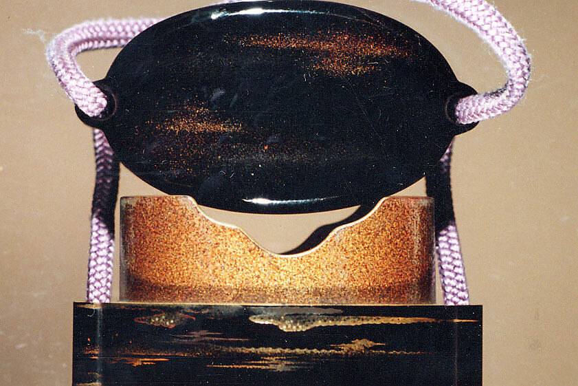 Case (Inrō) with Design of Pine Trees Growing from Rocks beneath Clouds, Lacquer, roiro, gold and silver hiramakie, takamakie, kirigane, nashiji; Interior: nashiji and fundame, Japan