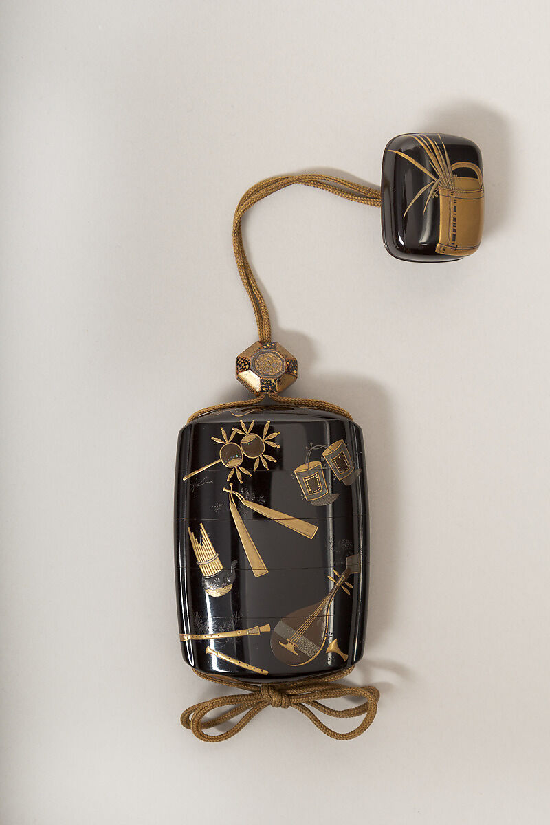 Inrō with Scattered Musical Instruments, Theatrical Implements, and Flowers, Shibata Zeshin (Japanese, 1807–1891), Four cases; lacquered wood with gold, silver hiramaki-e, mother-of-pearl inlay, and cut-out gold foil application on black ground
Netsuke: bucket with grasses and flowers; lacquer with gold hiramaki-e
Ojime: flowers; lacquer bead, Japan 