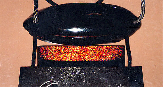 Case (Inrō) with Design of Sword Fittings, Lacquer, roiro ishime, black, gold, silver hiramakie, incised; Interior: nashiji and fundame, Japan