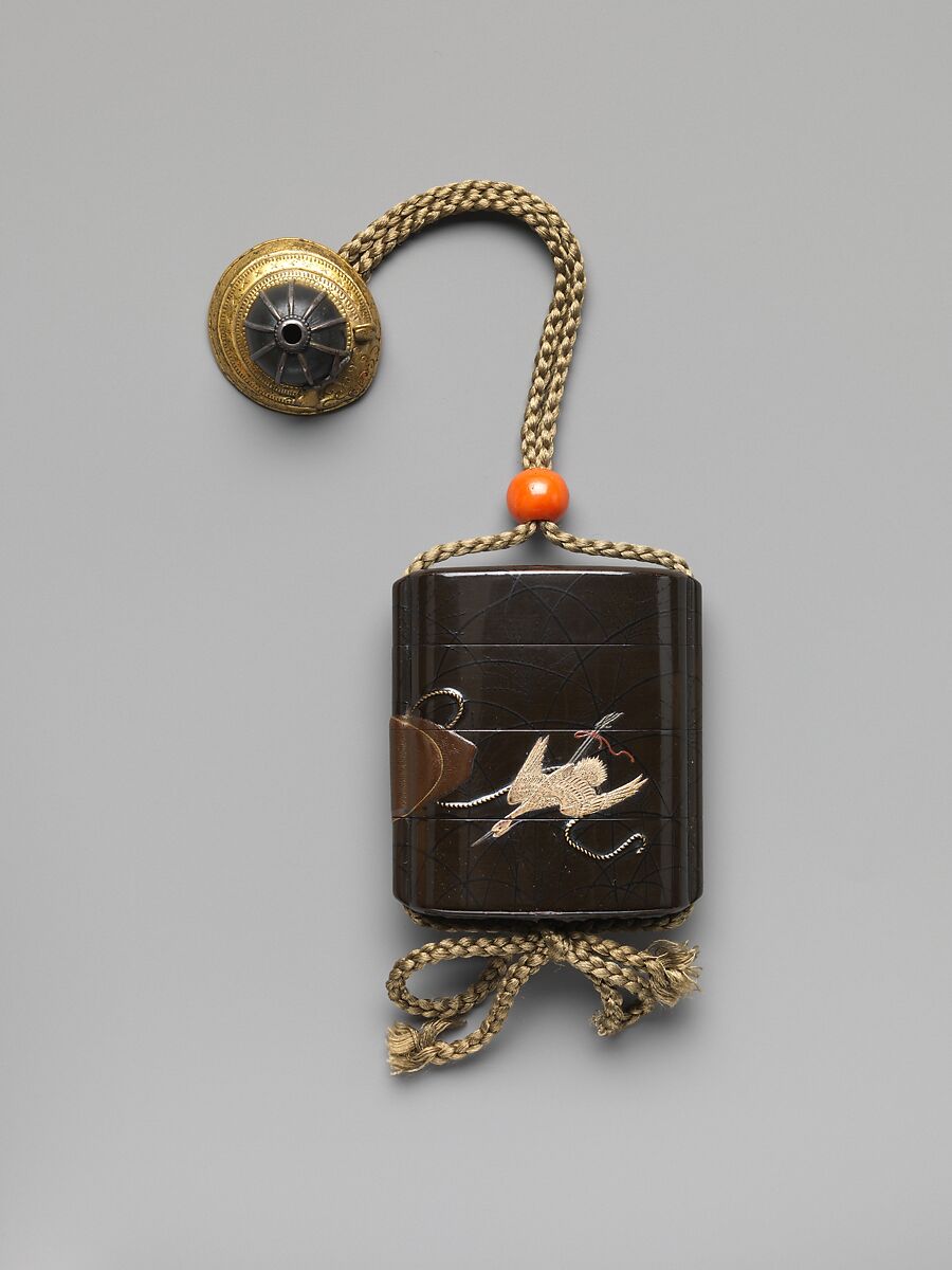 Inrō with Captured Heron, Black lacquer, black, gold, red, and white hiramaki-e, takamaki-e, ivory, and metal wireNetsuke: helmet; metalOjime: coral bead, Japan 