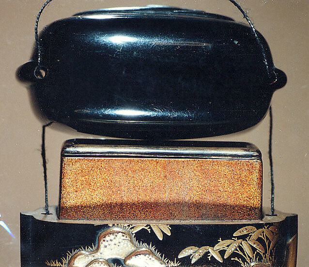 Case (Inrō) with Design of Animal Being Attacked by Crabs (obverse); Pond with Rocks and Plants (reverse), Lacquer, roiro, gold, red and silver hiramakie, takamakie, kirigane; Interior: nashiji and fundame, removable tray, Japan