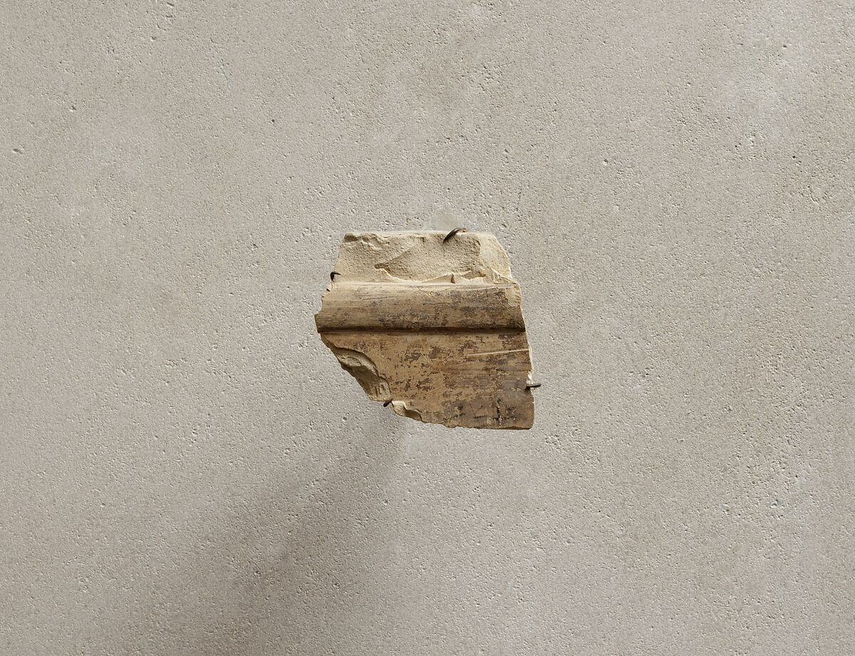 Relief from the tomb of Queen Neferu: the feet of an attendant, Limestone, paint 