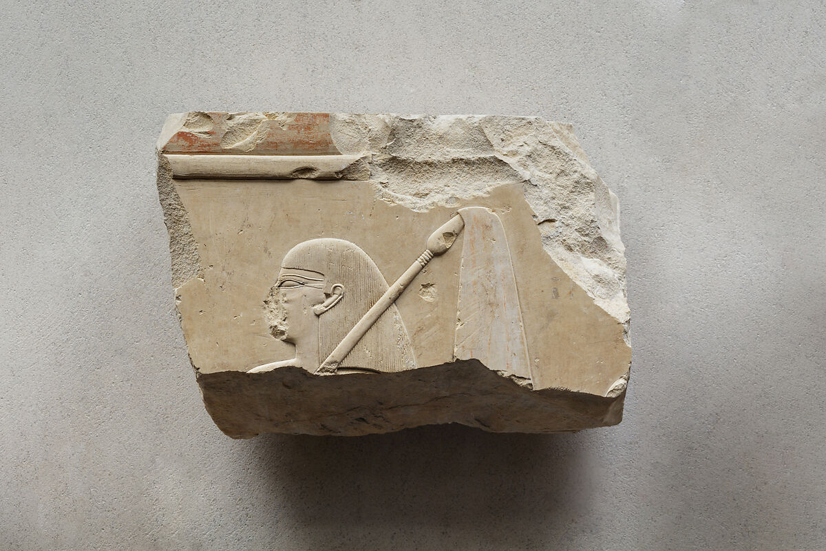 Relief of female attendant with sunshade - see 26.3.353-3, Limestone, paint 