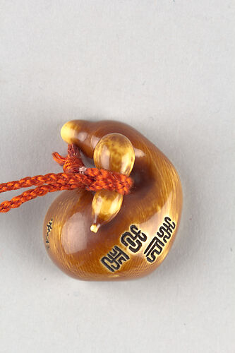 Netsuke of a Small Gourd on a Halved-Gourd