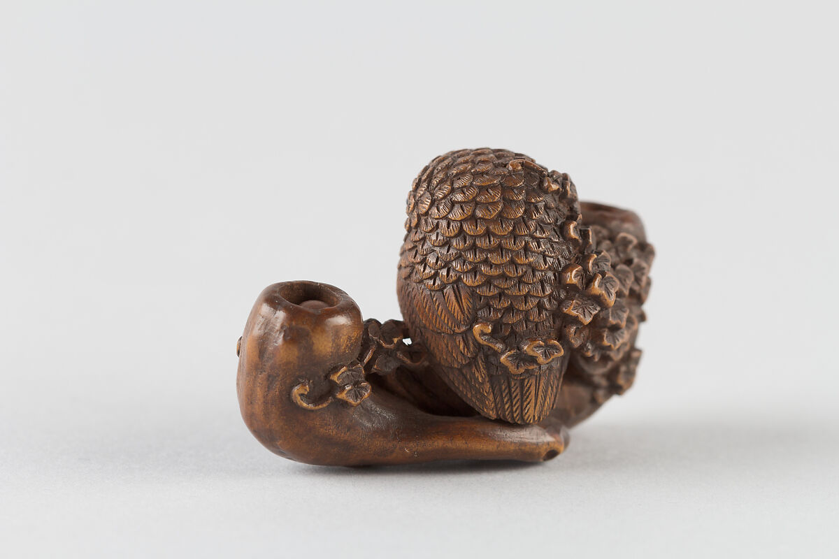 Netsuke of Owl on a Branch, Wood; inlaid glass eyes, Japan