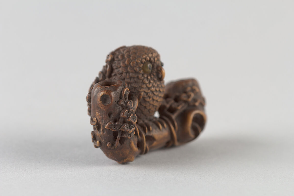 Netsuke of Owl on a Branch, Wood; inlaid glass eyes, Japan