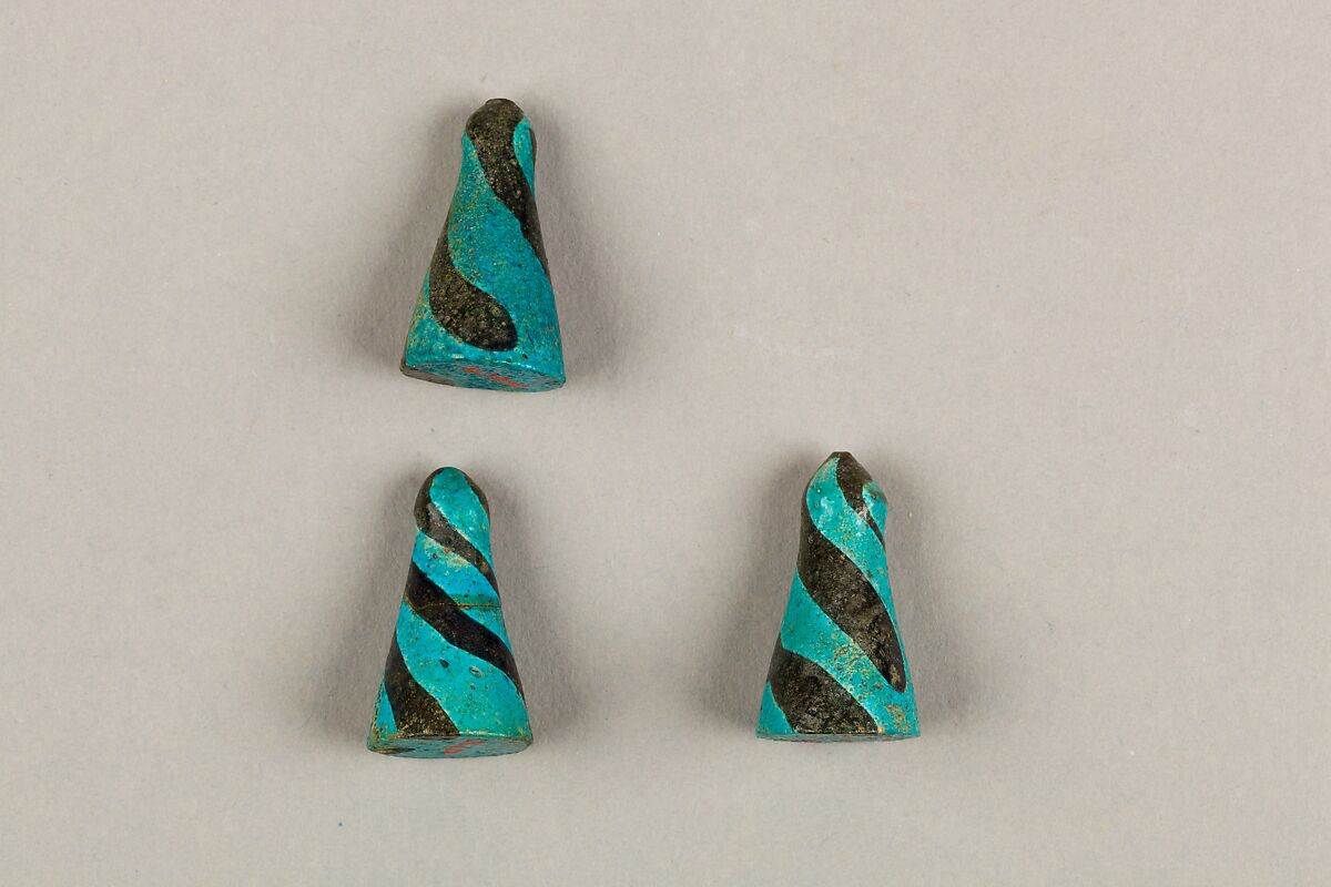 Eight Conical Gaming Pieces, Faience