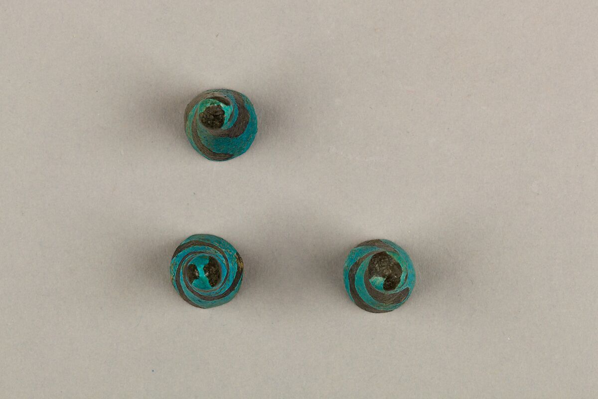 Eight Conical Gaming Pieces, Faience