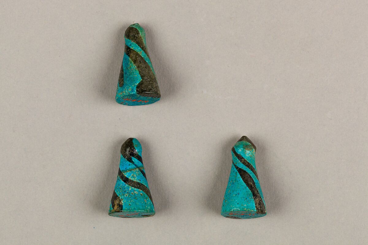 Eight Conical Gaming Pieces, Faience