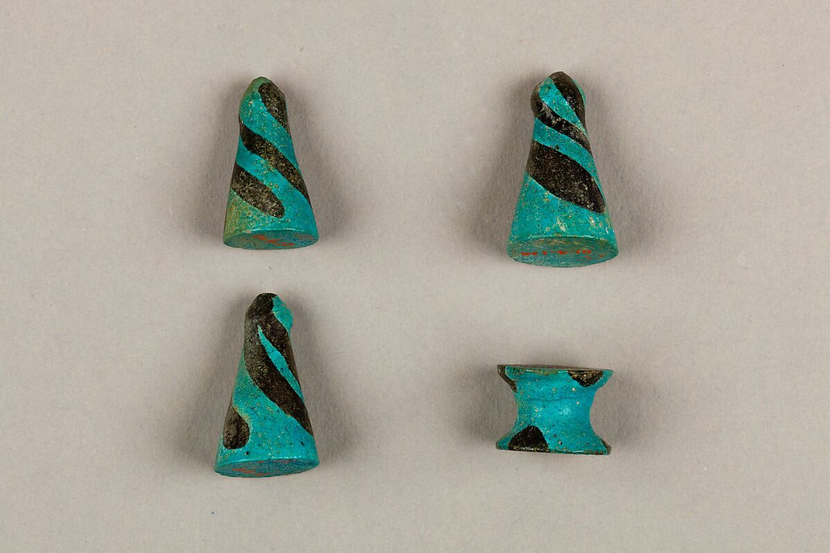 Eight Conical Gaming Pieces, Faience
