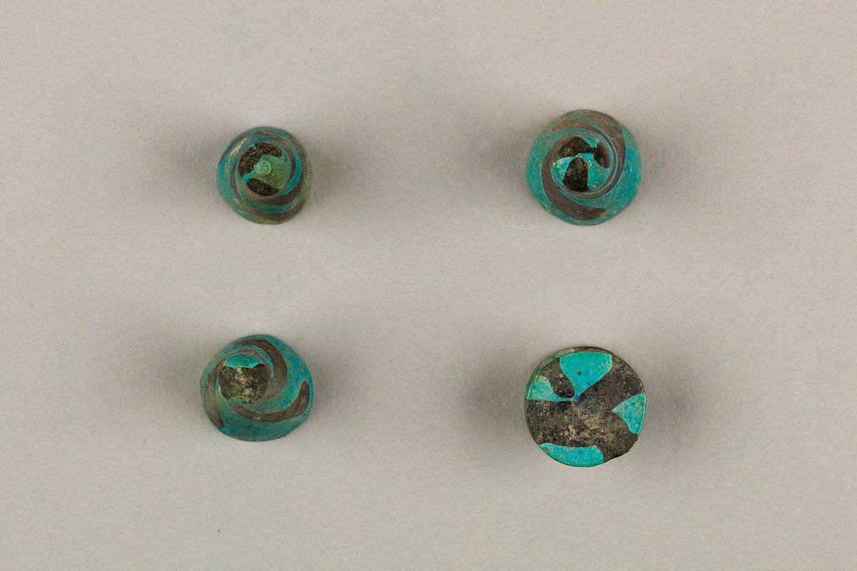 Eight Conical Gaming Pieces, Faience