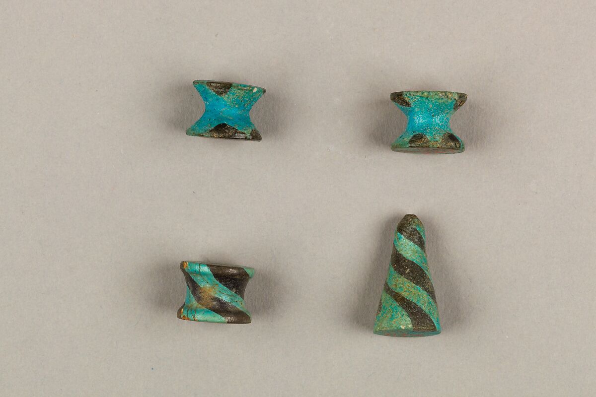 Eight Conical Gaming Pieces, Faience