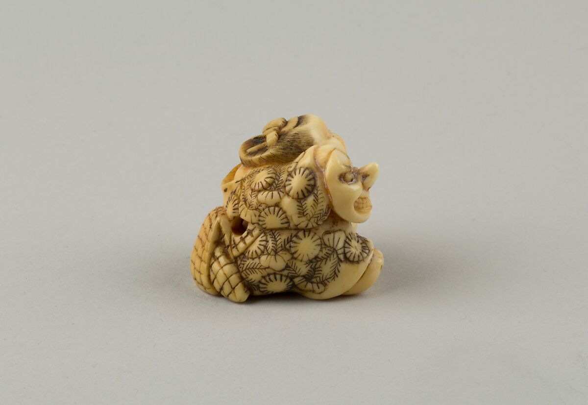Netsuke of Okame Holding a Mask, Ivory, Japan