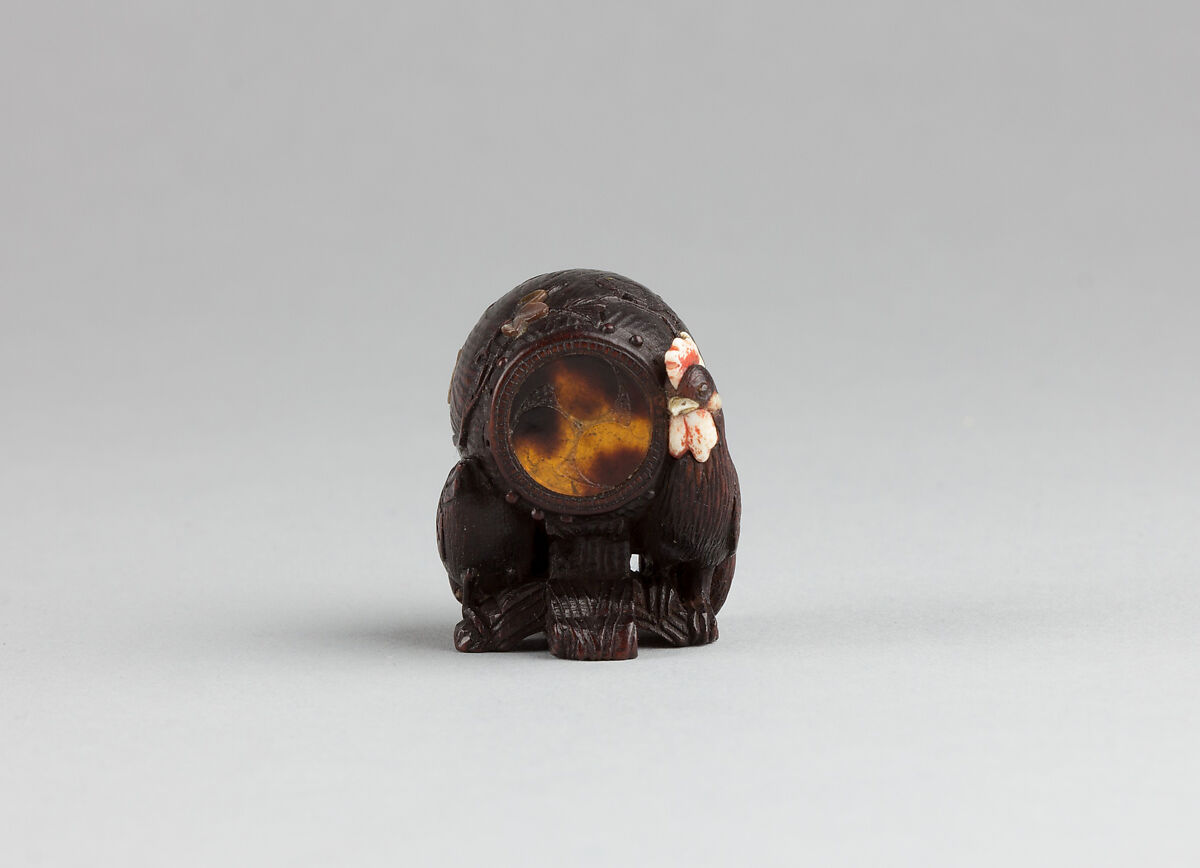 Netsuke, Wood inlaid with ivory and mother-of-pearl, Japan