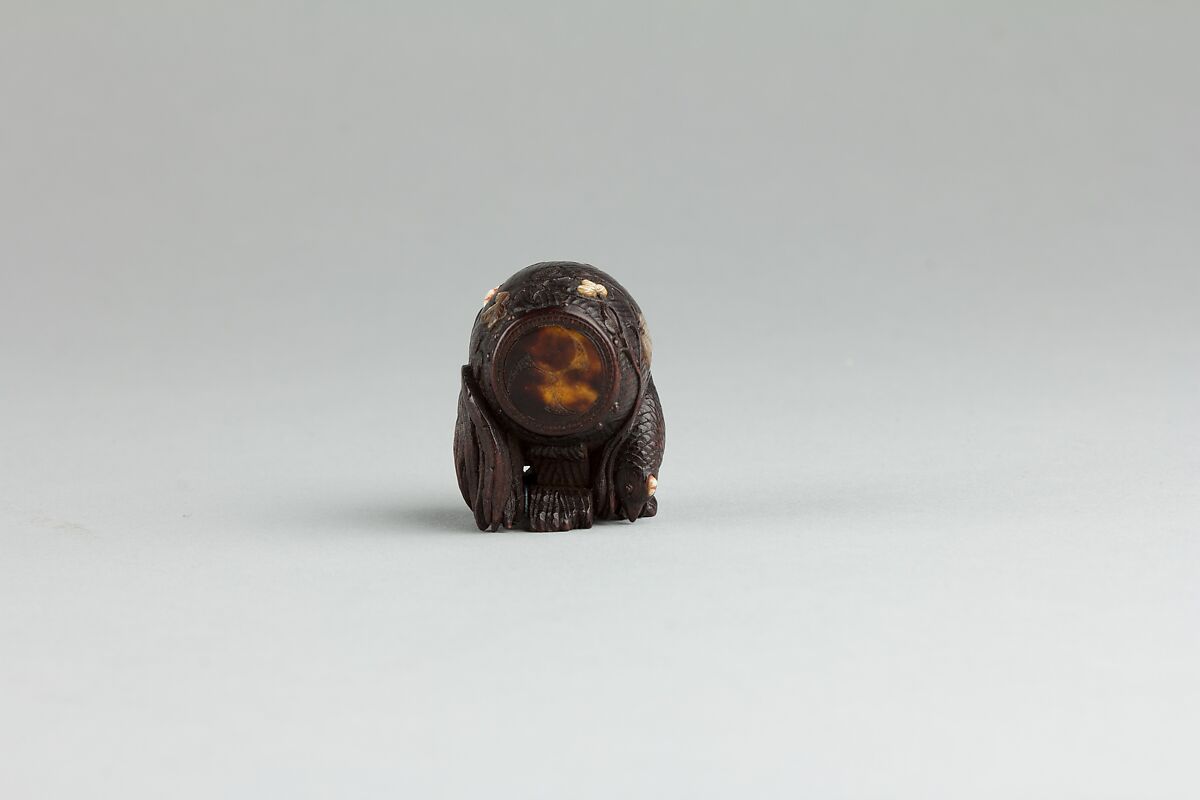 Netsuke, Wood inlaid with ivory and mother-of-pearl, Japan