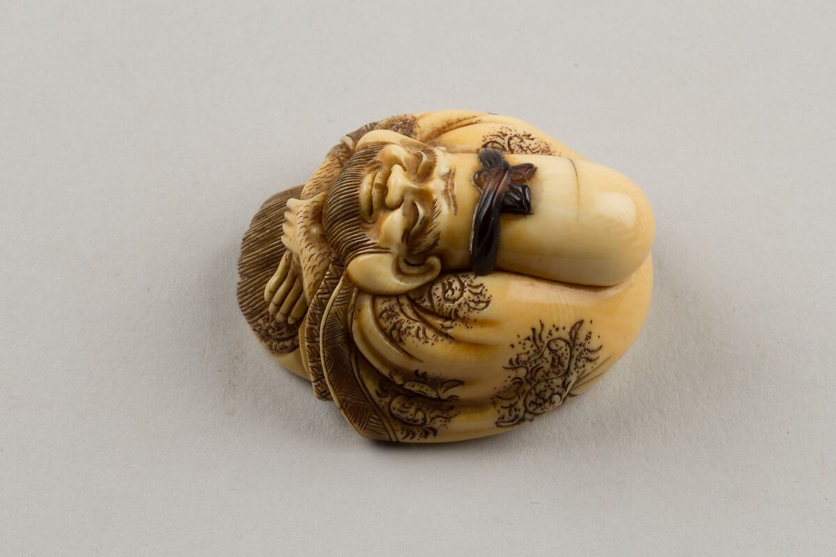 Netsuke of Fukurokuju, Ivory; inlaid tortoiseshell, Japan