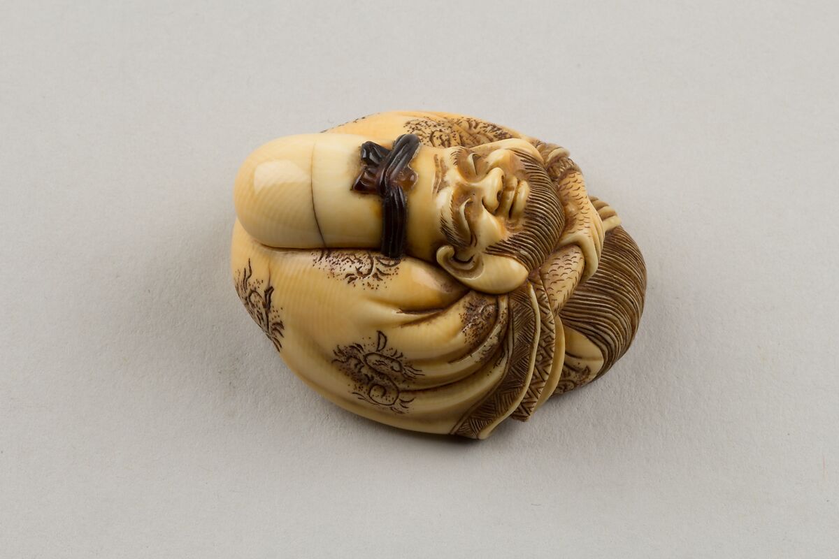 Netsuke of Fukurokuju, Ivory; inlaid tortoiseshell, Japan