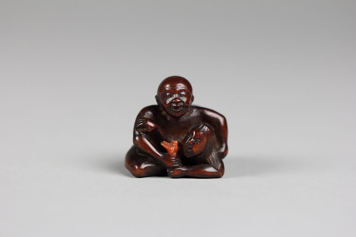 Netsuke of a Man Holding a Mermaid, Wood, Japan 