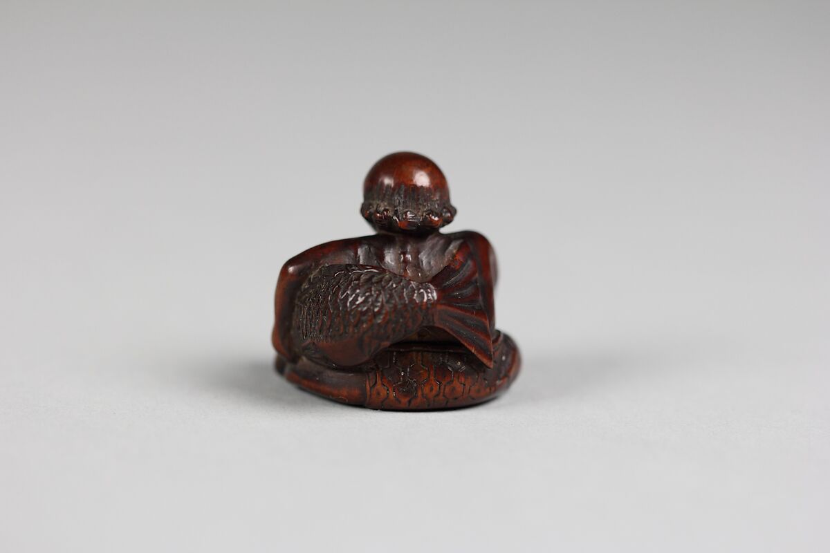 Netsuke of a Man Holding a Mermaid, Wood, Japan