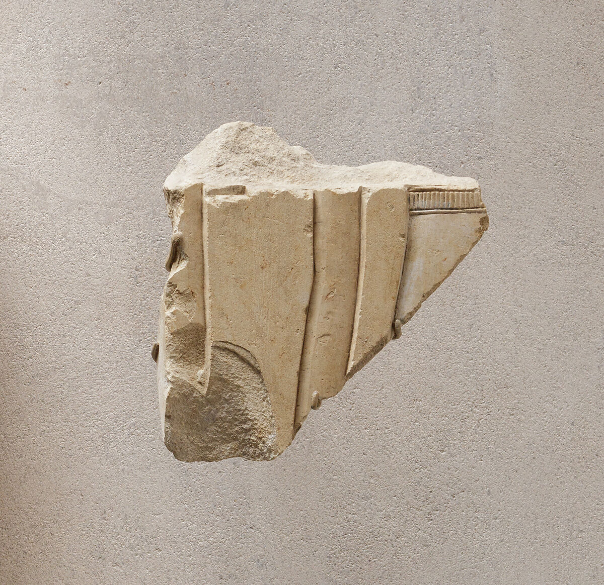 Relief fragment from a procession of attendants - see 31.3.1-1, Limestone, paint 