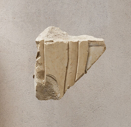 Relief fragment from a procession of attendants - see 31.3.1-1
