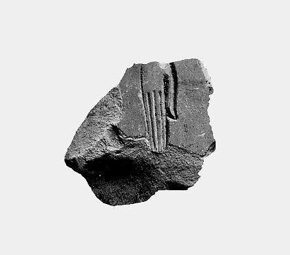 Relief fragment from a procession of attendants - see 31.3.1-1, Limestone, paint